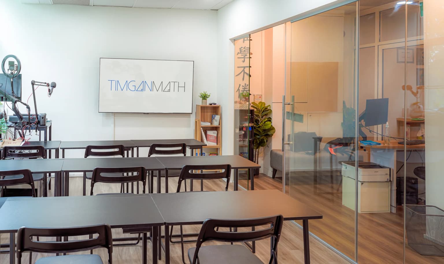 Tim Gan Math classroom with desks facing the teaching screen