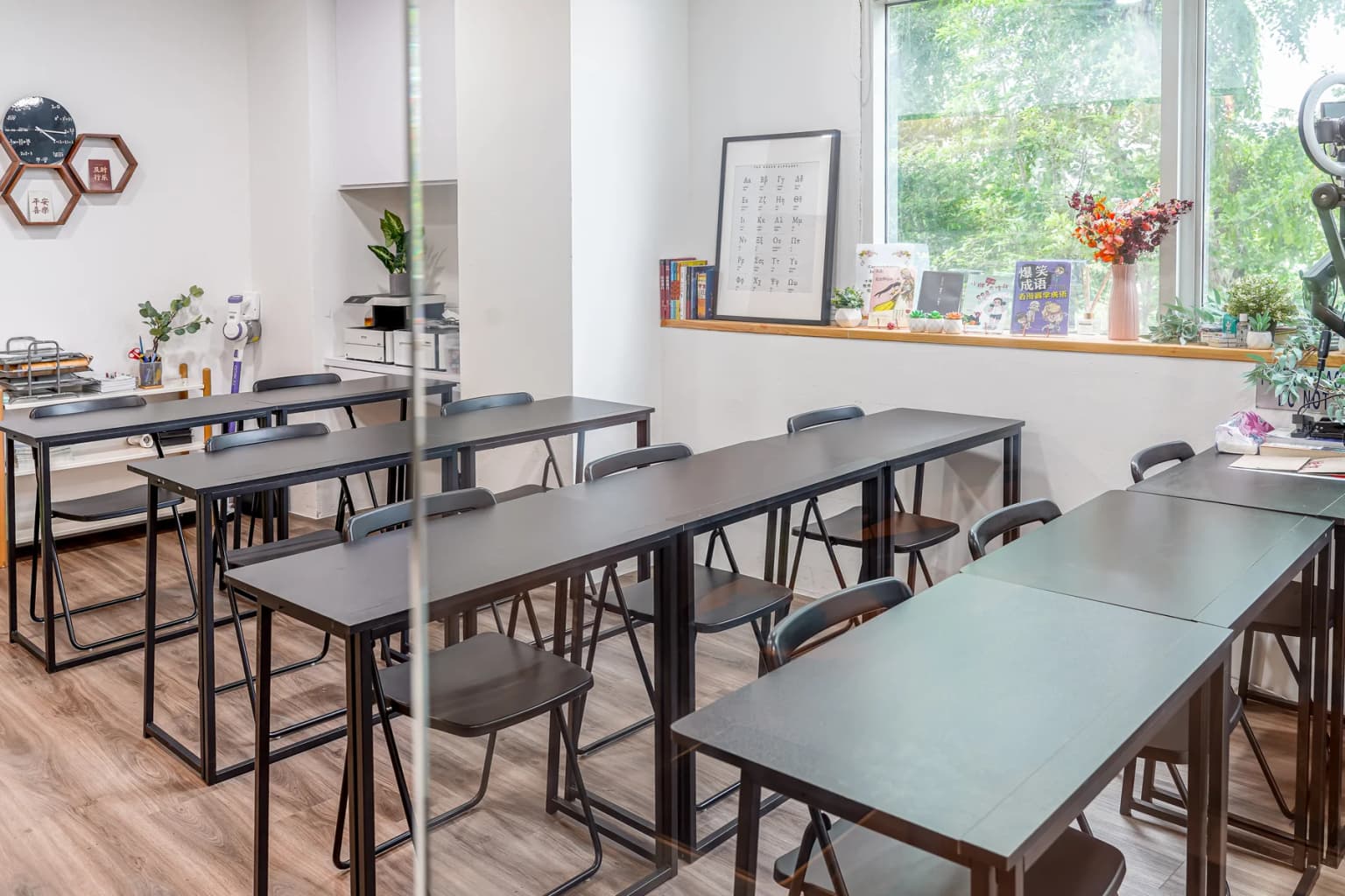 Bright Tim Gan Math classroom with individual desks and natural light